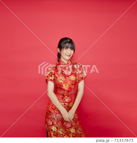Asian woman wear Chinese dress with action 71357675