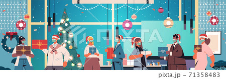 colleagues in santa hats wearing masks coworkers holding gifts new year and christmas holidays celebration 71358483