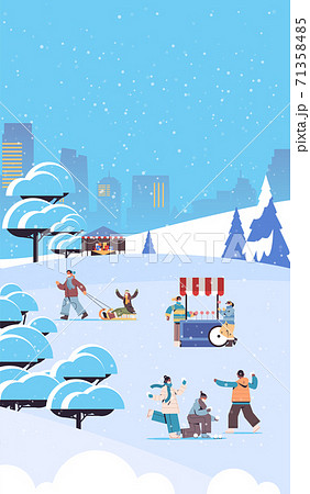 people in masks having winter fun spending time in park outdoors activities coronavirus quarantine 71358485