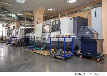 a number of CNC machines in the production room. Interior of industrial premises 71362088