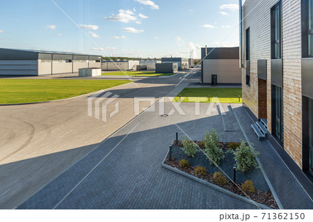 building of a modern industrial enterprise. Summer, blue sky 71362150