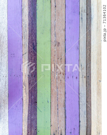 Painted wood texture pattern background in purple green brown color vintage style Painted wood texture pattern background in purple green brown color vintage style 71364102