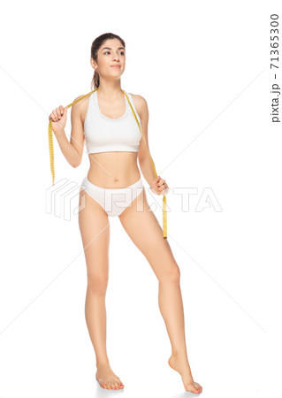 Beautiful woman in underwear isolated on white background. Beauty, cosmetics, spa, depilation, diet, treatment and fitness concept, sensual posing 71365300