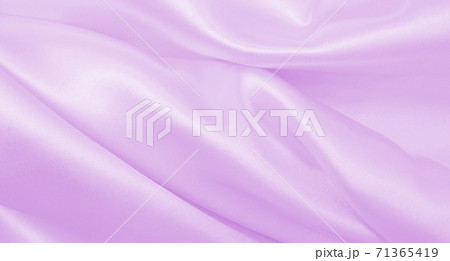 Smooth elegant lilac silk or satin texture as wedding background. Luxurious valentine day background design Smooth elegant lilac silk or satin texture as wedding background. Luxurious valentine day background design 71365419