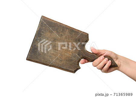 woman holding blank brown rectangular wooden board in hand woman holding blank brown rectangular wooden board in hand 71365989
