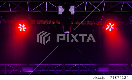 Colorful bright concert lighting equipment for stage at nightclub Colorful bright concert lighting equipment for stage at nightclub 71374124