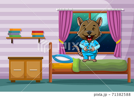 Happy mouse using the pajamas and standing in his bed 71382588