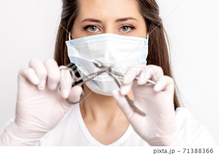 Manicure master holds manicure tools 71388366