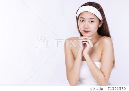Charming young woman wear headband touching her face with clean fresh body. Teenager before bathing  71391570