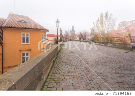 In the morning on Charles Bridge in Prague 71394168
