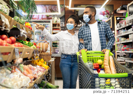 African American Couple Doing Grocery Shopping Together Buying Food 71394251