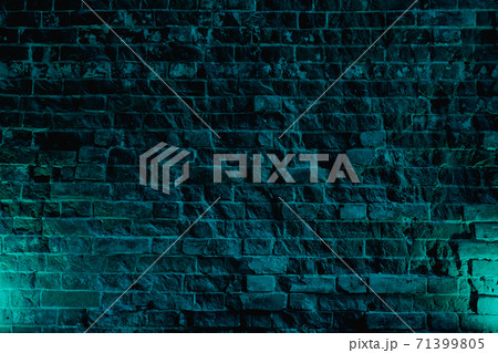 Solid brick wall with rough old masonry. Dark abstract background for the design.  71399805