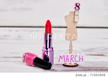 Cosmetics and dress mannequin. 71402608