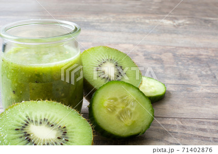Green smoothie with cucumber, kiwi and apples Green smoothie with cucumber, kiwi and apples 71402876