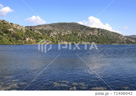 Koutavos Lagoon. Koutavos Lagoon is located on the Greek island of Kefalonia. The lagoon lies at the head of Argostoli Bay and acts as a nature reserve for wildlife including turtles and waterfowl. Koutavos Lagoon. Koutavos Lagoon is located on the Greek island of Kefalonia. The lagoon lies at the head of Argostoli Bay and acts as a nature reserve for wildlife including turtles and waterfowl. 71406042