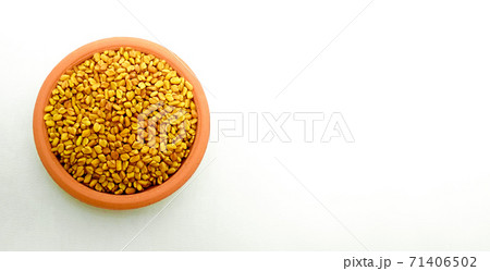 fenugreek or alholva seeds, copy space, white background, top view fenugreek or alholva seeds, copy space, white background, top view 71406502