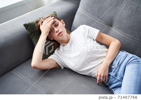 Woman suffering from headache Woman suffering from headache 71407766