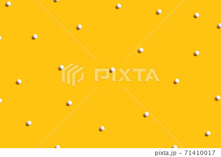 White small candies overhead view White small candies overhead view 71410017