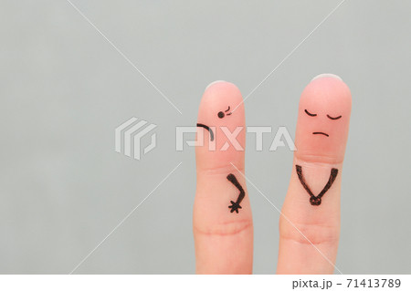 Fingers art of displeased couple. Woman was offended, man was guilty. Fingers art of displeased couple. Woman was offended, man was guilty. 71413789