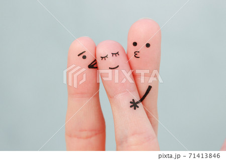 Fingers art. Concept boys kisses of girl on cheek. Fingers art. Concept boys kisses of girl on cheek. 71413846