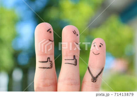 Fingers art of happy family. Concept parents are proud of their child. 71413879