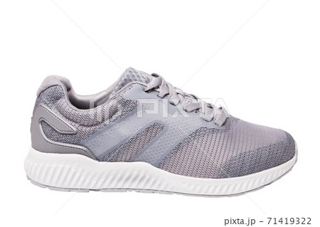 gray sneaker made of cloth mesh, on a white background, sports shoes gray sneaker made of cloth mesh, on a white background, sports shoes 71419322