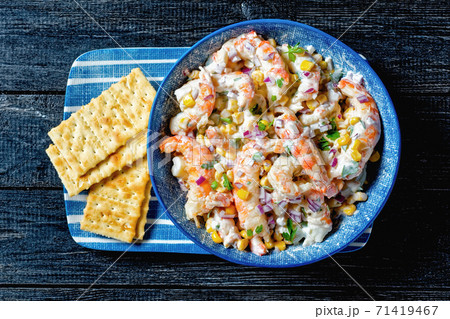 Shrimp salad with sour cream dressing, close-up 71419467