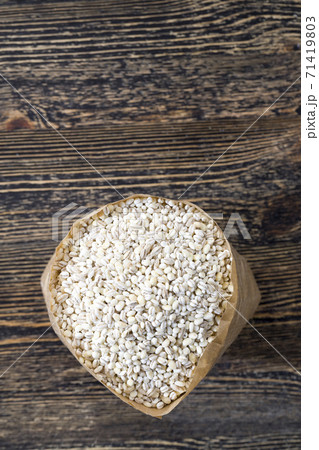 solid raw grain of pearl barley solid raw grain of pearl barley 71419803