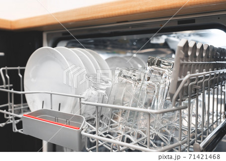 Open dishwasher with clean dishes 71421468