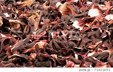 Full frame of dried Sudanese rose or hibiscus petals isolated on white background. Full frame of dried Sudanese rose or hibiscus petals isolated on white background. 71421651