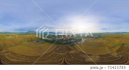 360 panorama by 180 degrees angle seamless panorama of aerial view of Big Golden Buddha Statue and pagoda in Tiger Cave Temple or Wat Tham Suea in Kanchanaburi, Thailand. Famous tourist attraction. 71421783