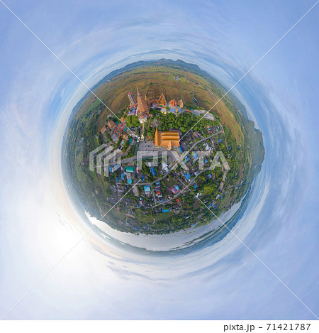 Little planet 360 degree sphere. Panorama of aerial view of Big Golden Buddha Statue and pagoda in Tiger Cave Temple or Wat Tham Suea in Kanchanaburi, Thailand. Famous tourist attraction. Little planet 360 degree sphere. Panorama of aerial view of Big Golden Buddha Statue and pagoda in Tiger Cave Temple or Wat Tham Suea in Kanchanaburi, Thailand. Famous tourist attraction. 71421787