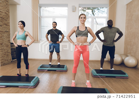 People are engaged in fitness in the modern gym. 71422951