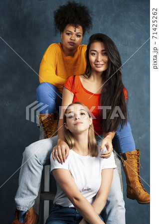 diverse nation girls group, teenage friends company cheerful having fun, happy smiling, cute posing on blue background, lifestyle people concept diverse nation girls group, teenage friends company cheerful having fun, happy smiling, cute posing on blue background, lifestyle people concept 71425262