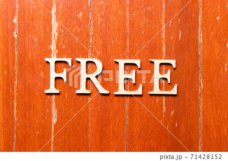 Alphabet letter in word free on old red color wood plate background Alphabet letter in word free on old red color wood plate background 71428152