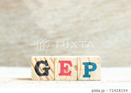 Alphabet letter in word GEP (abbreviation of good engineering practice) on wood background 71428154