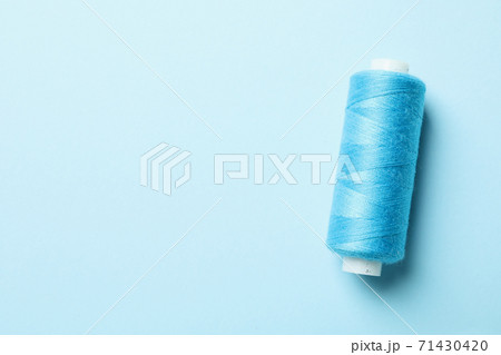 Blue Sewing thread background Stock Photo by ©Art_of_Life 79493776