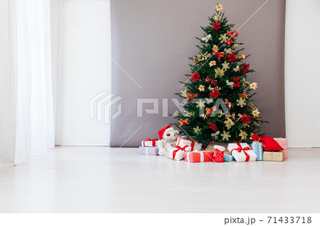 Christmas tree decor with gifts for the new year interior Christmas tree decor with gifts for the new year interior 71433718