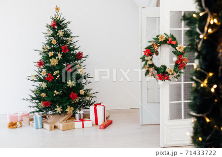 Garland Christmas tree pine with gifts for the new year decor interior red white Garland Christmas tree pine with gifts for the new year decor interior red white 71433722