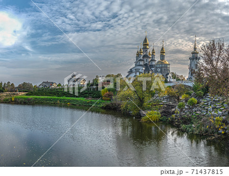 Landscape park and Temple Christian Orthodox complex the Church of St. Eugene on the banks of the Rostavitsya river. Buky, Ukraine 71437815