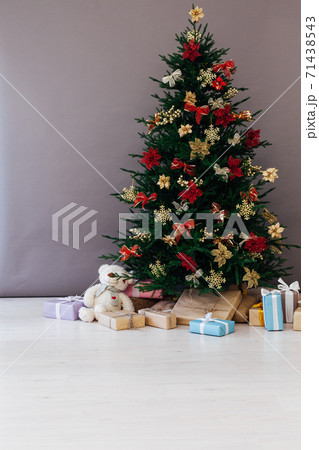 Christmas tree decor with gifts for the new year interior Christmas tree decor with gifts for the new year interior 71438543