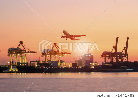 shipping boat and cargo plane flying against beautiful sky 71441788