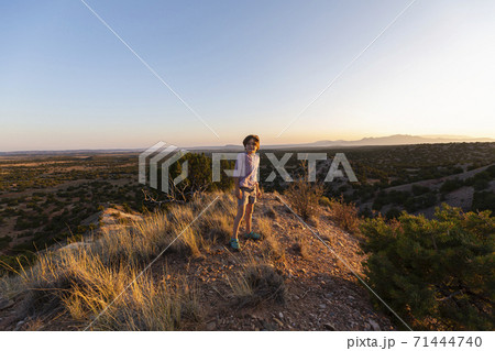 Young boy overlooking Galisteo Basin, Santa Fe 71444740