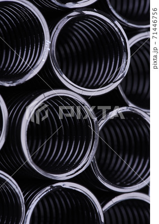 Corrugated pipe for installation of electrical cable, closeup 71446756