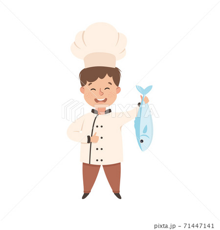 Cute Boy Chef Cooking Fresh Fish, Smiling Kid in Chef Uniform Cooking in Kitchen Cartoon Style Vector Illustration 71447141