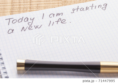 Top view workplace notebook and pen on wood table background, retro effect. The inscription - today I begin a new life. The concept of renewal and lifestyle changes Top view workplace notebook and pen on wood table background, retro effect. The inscription - today I begin a new life. The concept of renewal and lifestyle changes 71447995