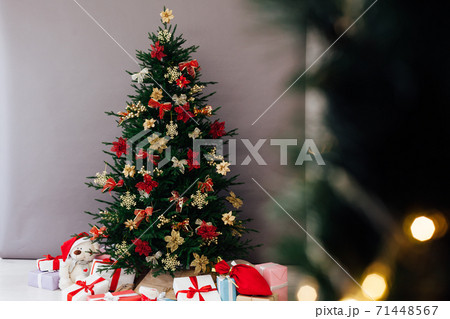 Christmas tree decor with gifts for the new year interior Christmas tree decor with gifts for the new year interior 71448567