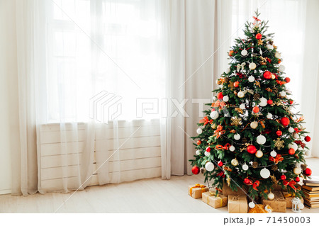 Christmas decor home window the interior of the Christmas tree with gifts for the new year 71450003