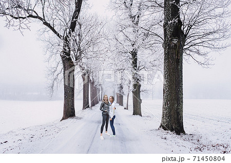 Women in winter scene 71450804