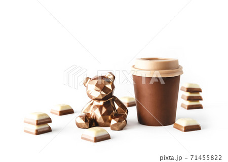 Beautiful chocolate bear with chocolate takeaway cup of coffee on isolated white background. Abstract design template on white backdrop. Food and drink concept. Coffee background. 71455822